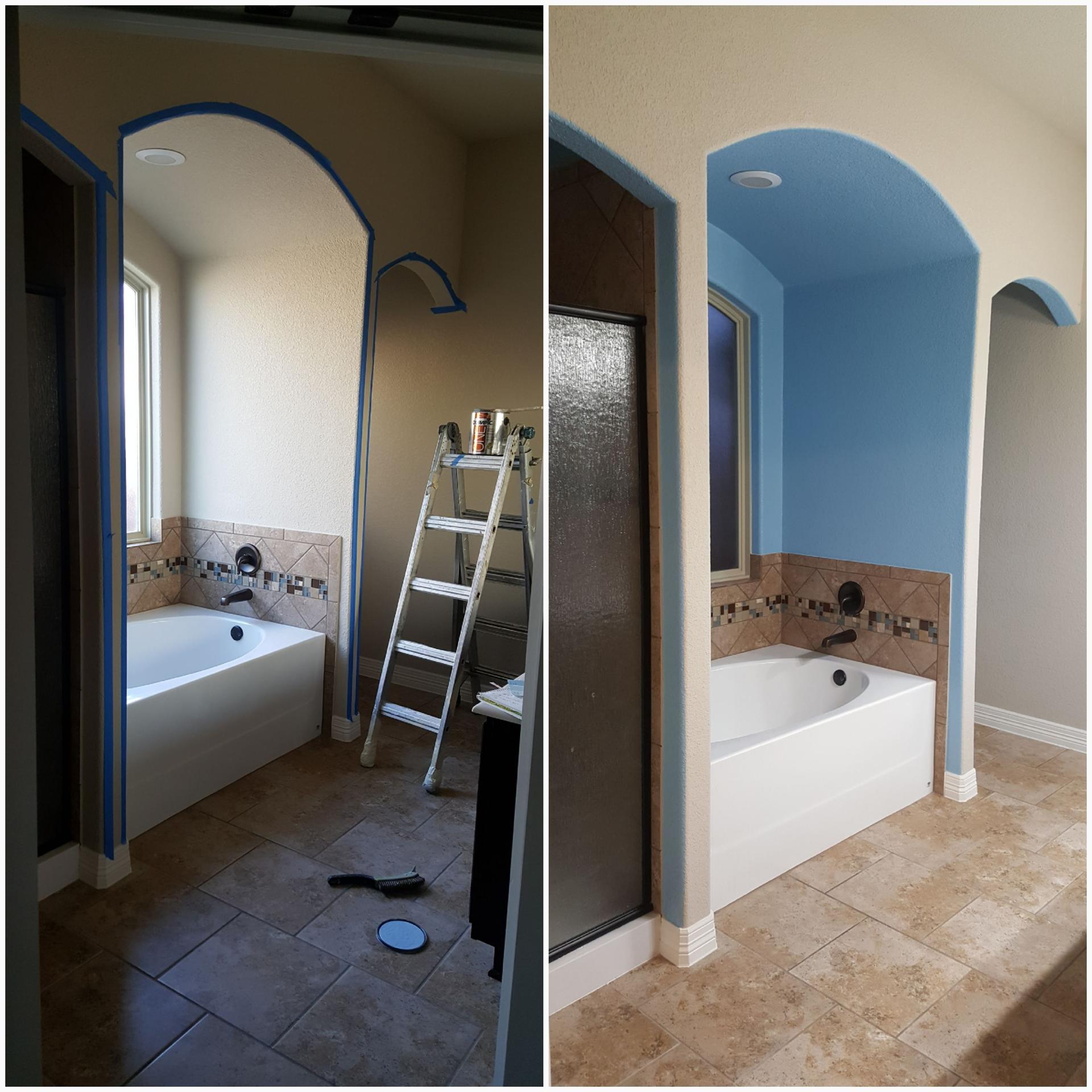Before and after bathroom archway repaint in a soft blue accent